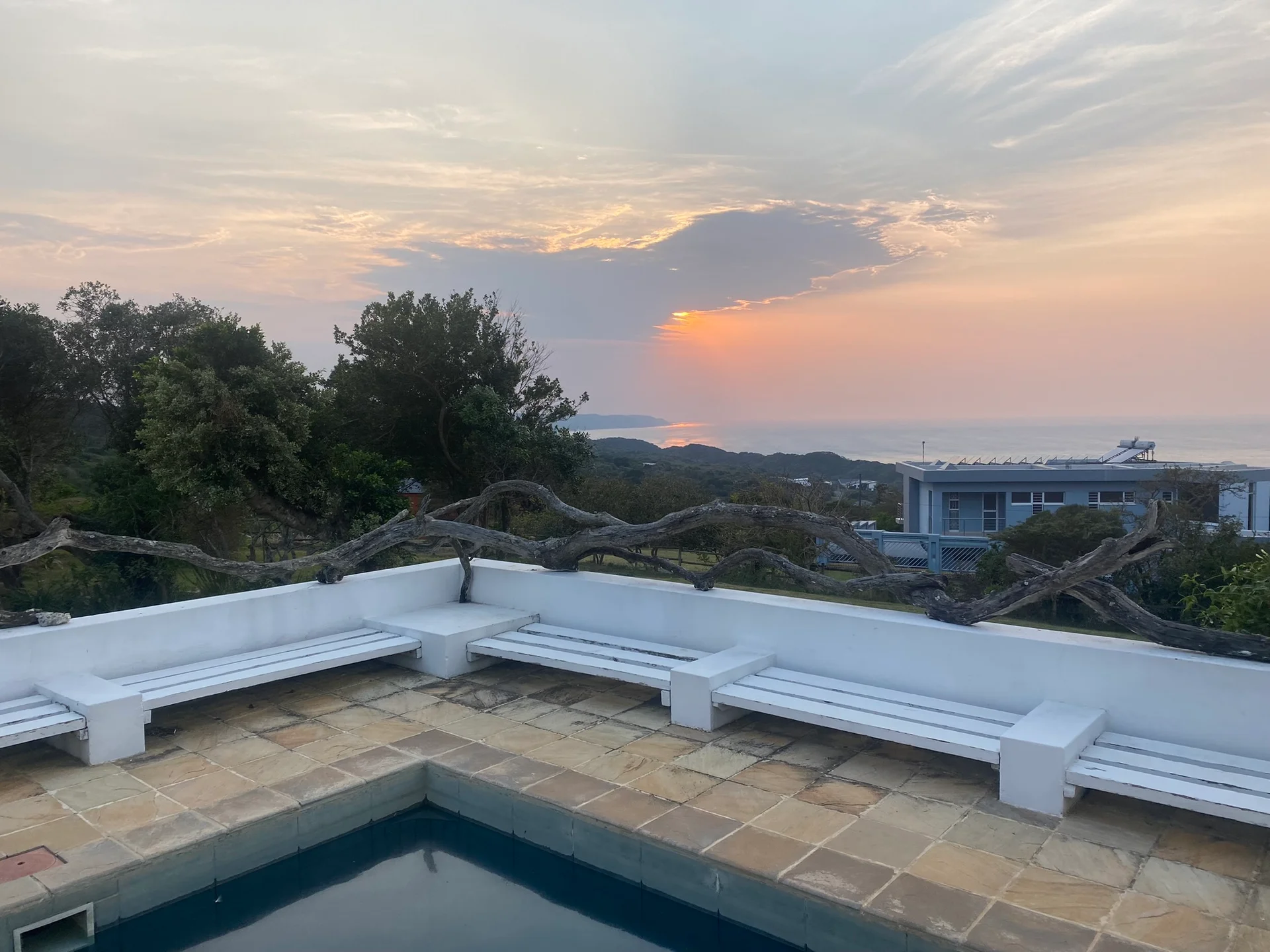 Sunset sea view from the pool terrace at Schafli Manor